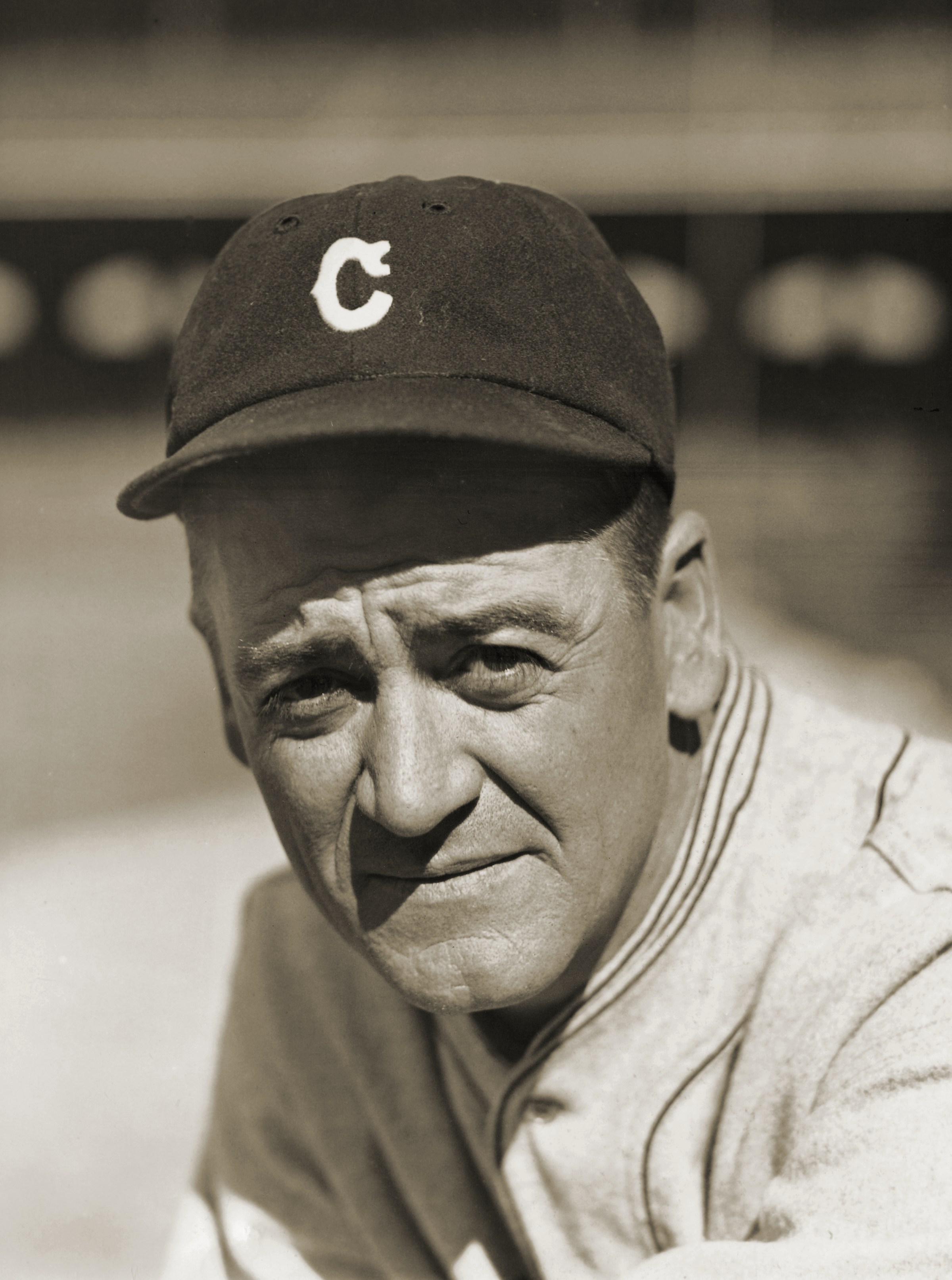 (Original Caption) The baseball career of George Burns started in Monmouth, Ill., in the Illinois-Missouri league, and his teammate was Gus Williams. A story told by an old friend of Burns, today, was that one time when a game was in progress in Monmouth, the smoke came over the diamond so dense from Maple City Pottery Company that the players could not be seen and Burns made a steal to second base. Burns was voted the most valuable player to his team in 1926 by a committee of eight baseball writers. His batting average for the season was .358, he scored 97 run himself and drove in 114, and established a major league record for two base hits, 64. When Burns and Williams split up, Williams went to the St. Louis Browns and Burns to the Cleveland Indians. George Burns, stellar first baseman for the Indians. (Photo by George Rinhart/Corbis via Getty Images)