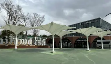 Large umbrella (in front of Flags) [Photo: provided by the baseball team]