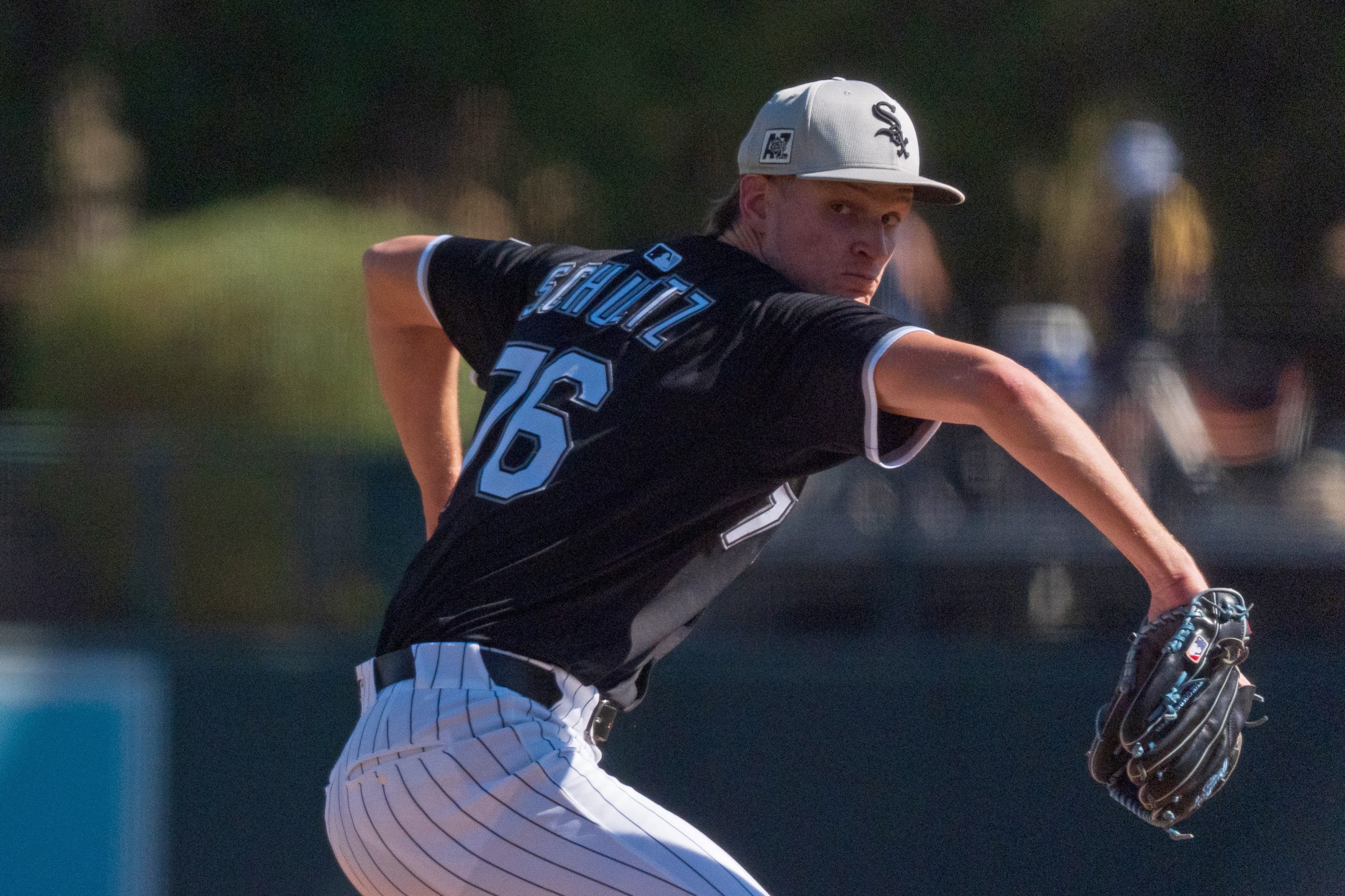 Feb 26, 2025; Phoenix, Arizona, USA; Chicago White Sox pitcher Noah Schultz (76) throws the first pitches of his major league career during the fifth inning of a spring training game against the San Diego Padres at Camelback Ranch. Mandatory Credit: Allan Henry-Imagn Images