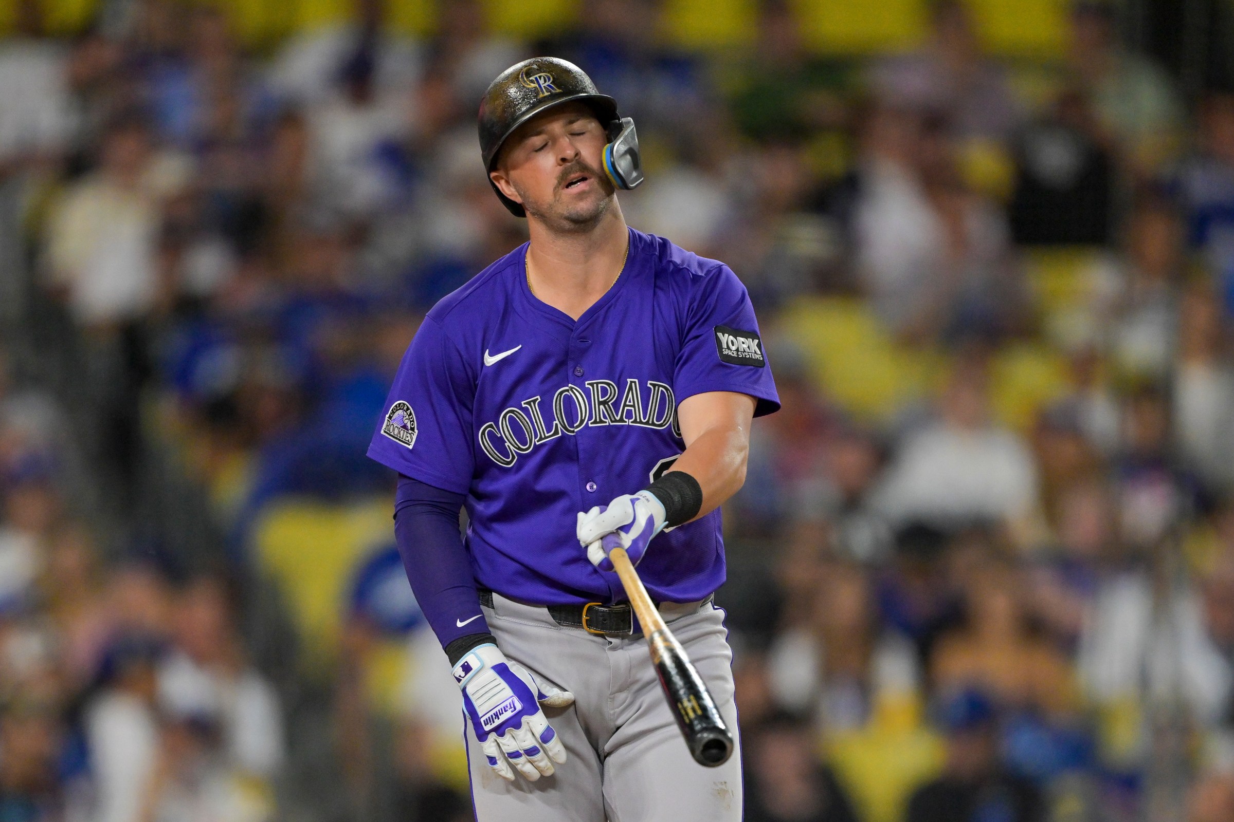 Sep 10, 2025; Los Angeles, California, USA; Colorado Rockies second baseman Kyle Farmer (6) reacts after striking out in the first inning against the Los Angeles Dodgers at Dodger Stadium. Mandatory Credit: Jayne Kamin-Oncea-Imagn Images