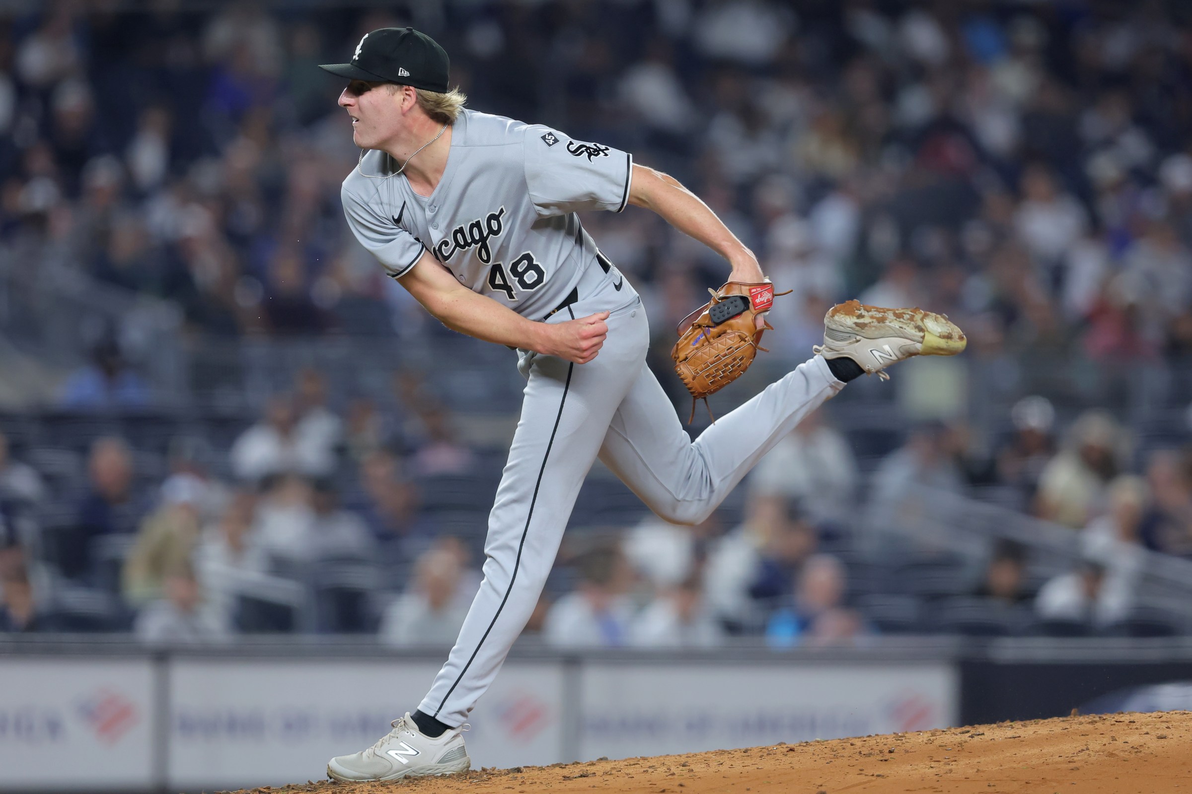 Sep 24, 2025; Bronx, New York, USA; Chicago White Sox relief pitcher Jonathan Cannon (48) follows through on a pitch against the New York Yankees during the second inning at Yankee Stadium. Mandatory Credit: Brad Penner-Imagn Images