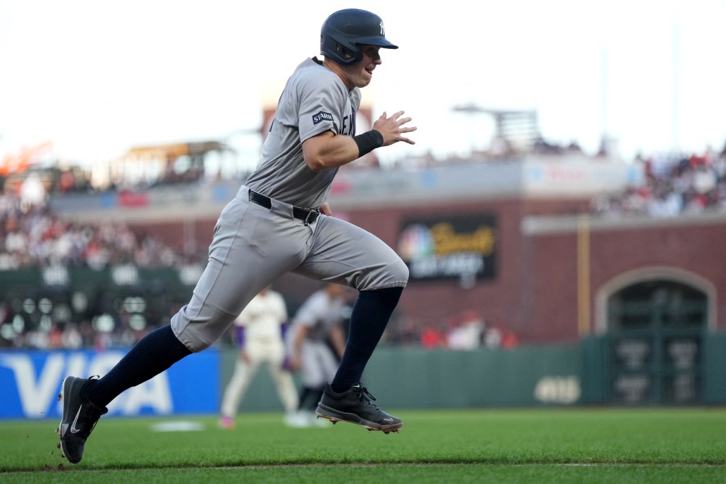 New York Yankees first baseman Ben Rice runs towards home plate.