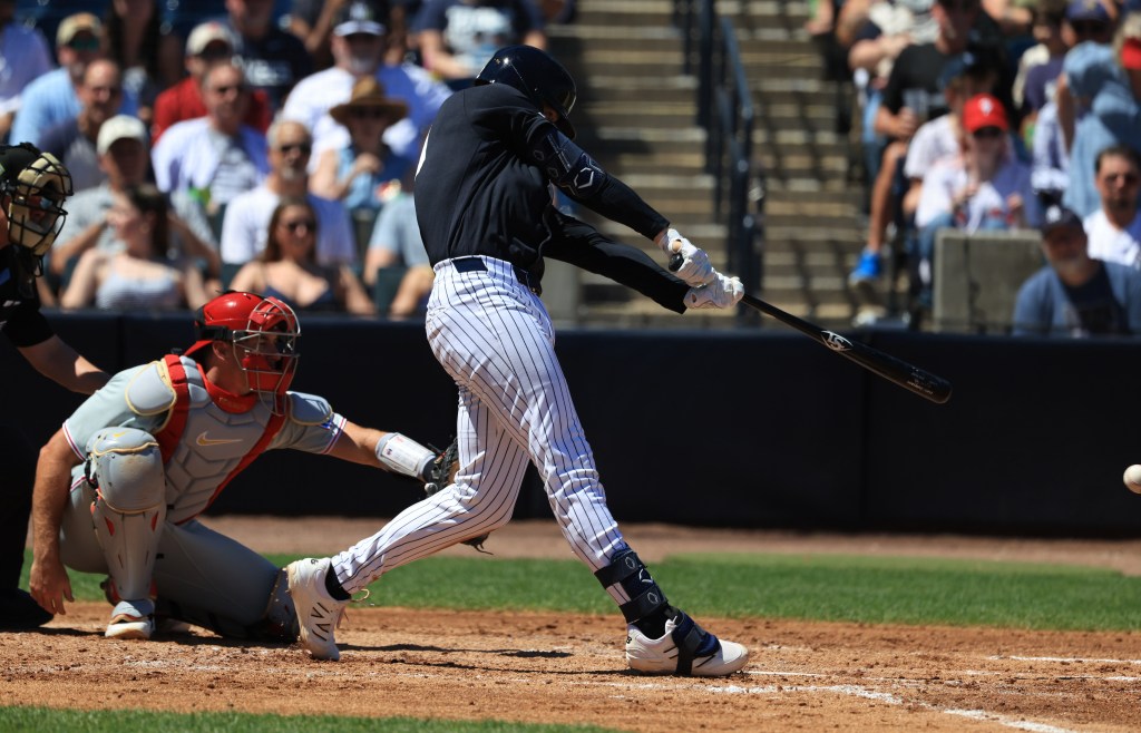 New York Yankees infielder Ryan McMahon hits an RBI single against the Philadelphia Phillies.