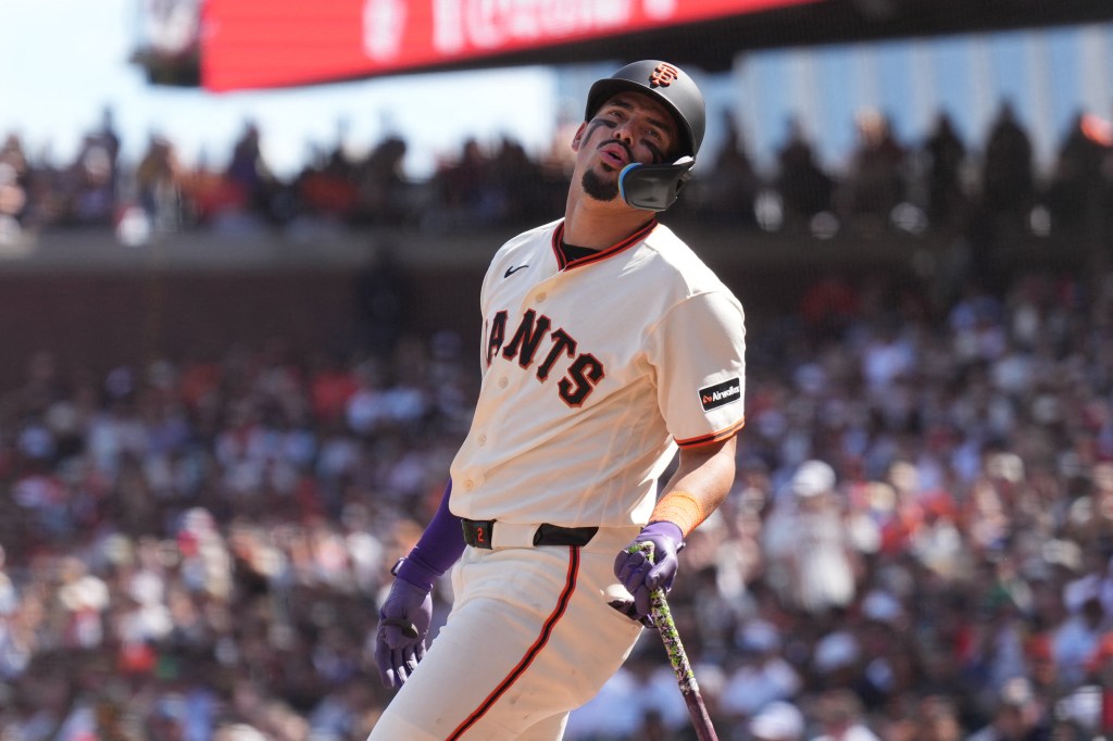 San Francisco Giants shortstop Willy Adames (2) reacts after fouling a ball.