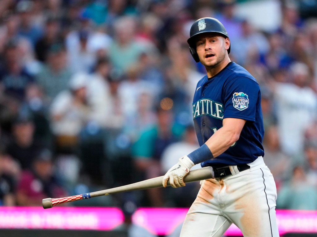 Seattle Mariners' Jarred Kelenic reacts after grounding out.