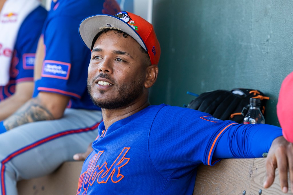 New York Mets Pitcher Freddy Peralta (51) sits in the dugout during Spring Training.