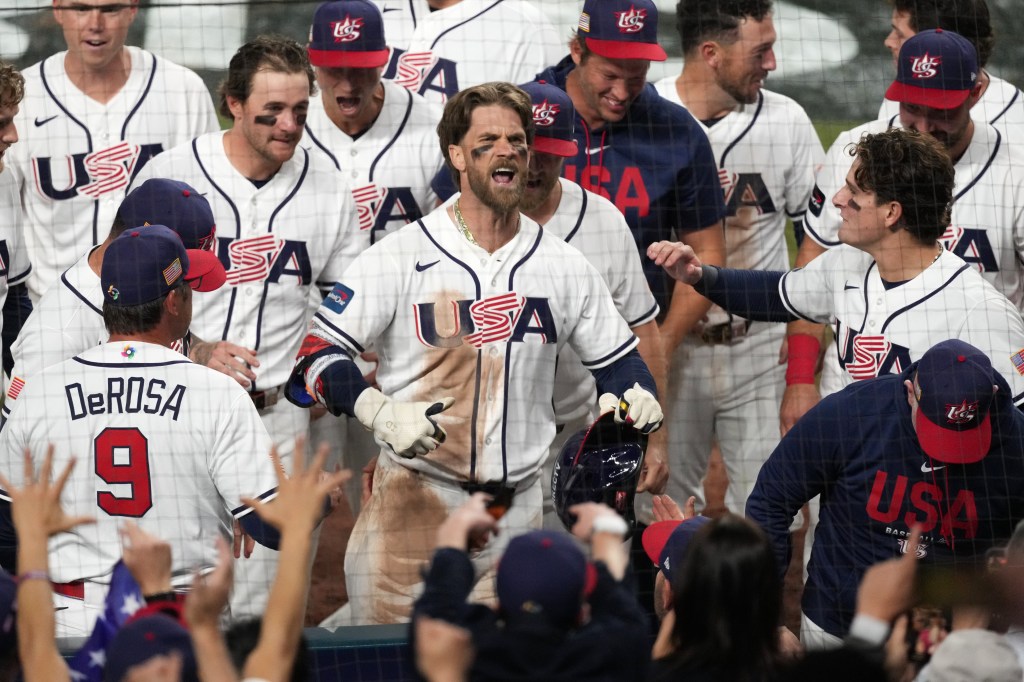 Bryce Harper celebrating after hitting a two-run home run.