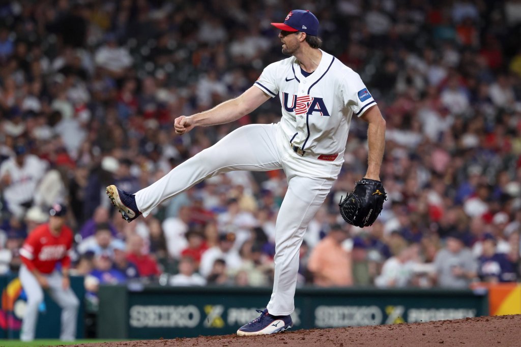 United States pitcher Clay Holmes (35) throws a pitch against Great Britain.