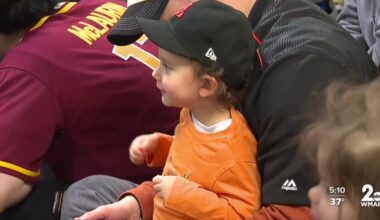 Young Orioles fans celebrate upcoming Opening Day with the Oriole Bird