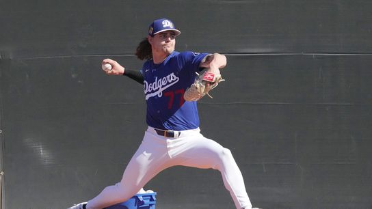 Los Angeles Dodgers pitcher River Ryan throws bullpen during spring training camp. 