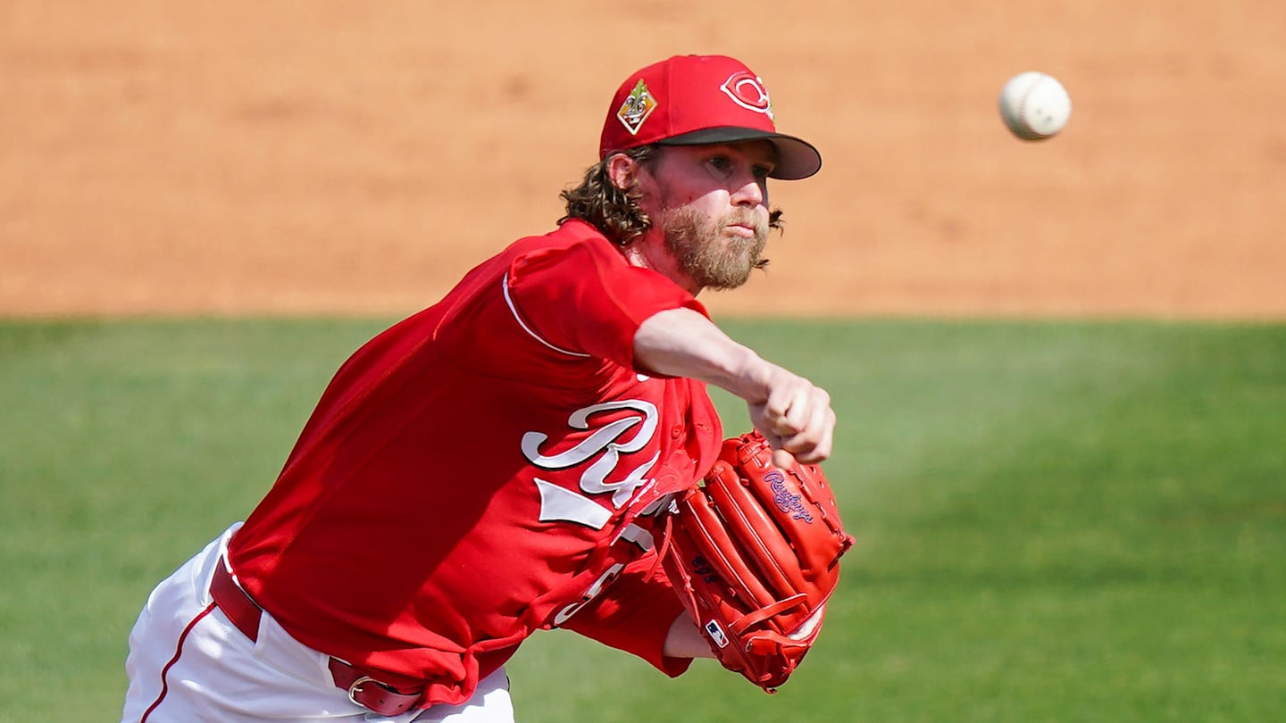 Cincinnati Reds pitcher Pierce Johnson (52) throws a pitch in the fifth inning of a Cactus League game between the Cincinnati Reds and Kansas City Royals, Tuesday, Feb. 24, 2026, at Goodyear Ballpark in Goodyear, Ariz.