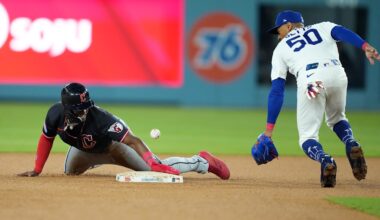 Mar 30, 2026: Cleveland Guardians right fielder Angel Martinez (1) steals second base against Los Angeles Dodgers shortstop Mookie Betts (50) during the fifth inning at Dodger Stadium.