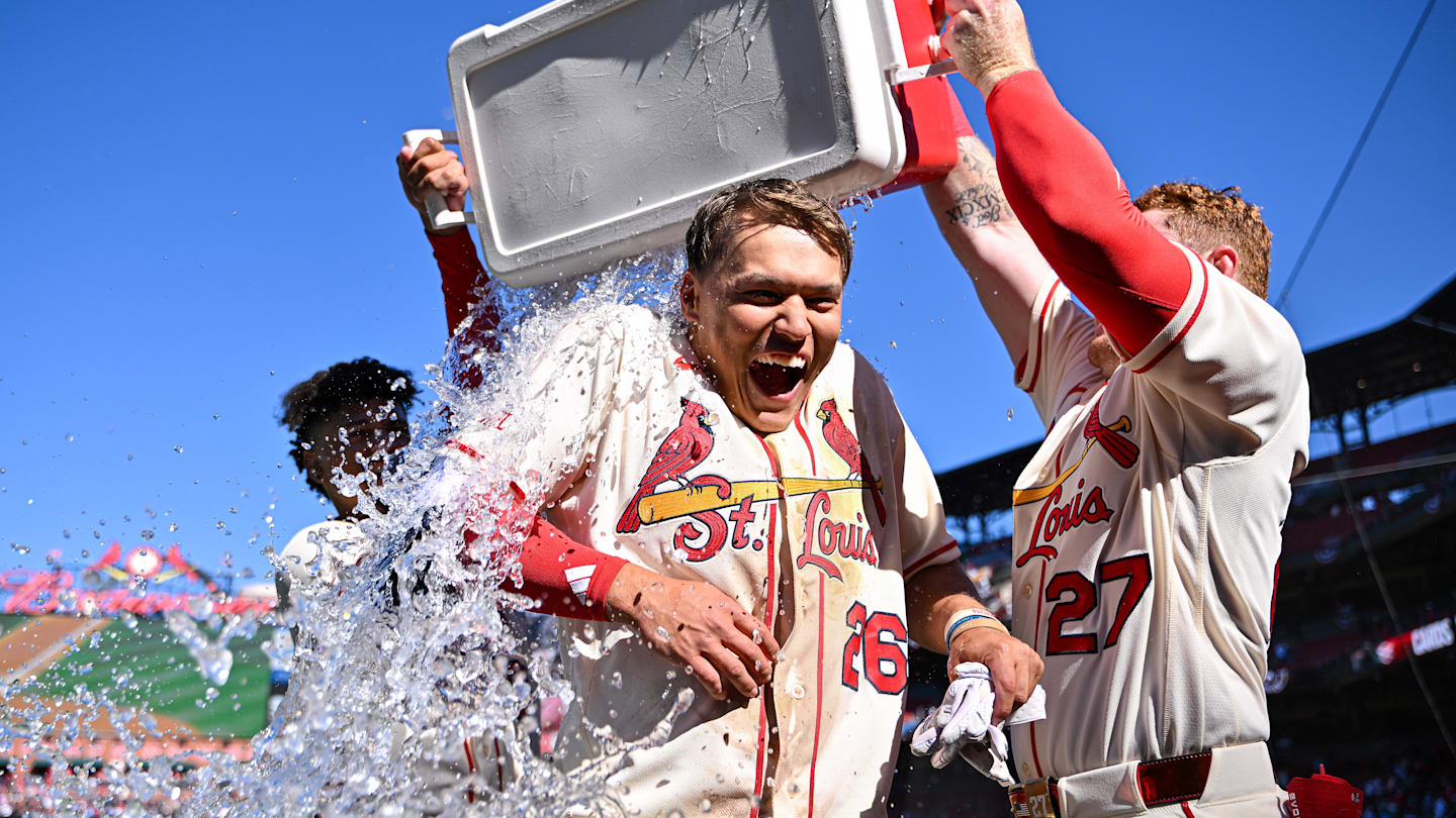 Mar 28, 2026; St. Louis, Missouri, USA; St. Louis Cardinals shortstop JJ Wetherholt (26) is doused with water by shortstop Masyn Winn (0) and left fielder Nathan Church (27) after hitting a walk-off two run single against the Tampa Bay Rays during the tenth inning at Busch Stadium. Mandatory Credit: Jeff Curry-Imagn Images