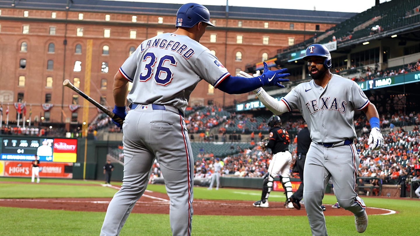 Mar 31, 2026; Baltimore, Maryland, USA; Texas Rangers shortstop Ezequiel Duran (20) celebrates with Texas Rangers left fielder Wyatt Langford (36) after hitting a home run during the third inning against the Baltimore Orioles at Oriole Park at Camden Yards. Mandatory Credit: Daniel Kucin Jr.-Imagn Images