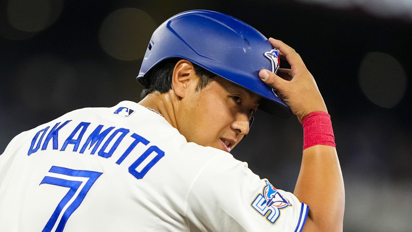 Mar 30, 2026; Toronto, Ontario, CAN; Toronto Blue Jays Kazuma Okamoto (7) tips his helmet after taking a walk against the Colorado Rockies during the fifth inning at Rogers Centre. Mandatory Credit: Kevin Sousa-Imagn Images