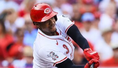 Aug 13, 2025; Cincinnati, Ohio, USA; Cincinnati Reds third baseman Ke'Bryan Hayes (3) hits a single in the third inning against the Philadelphia Phillies at Great American Ball Park. Mandatory Credit: Katie Stratman-Imagn Images