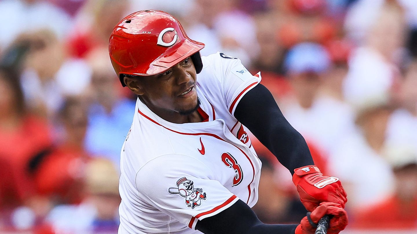 Aug 13, 2025; Cincinnati, Ohio, USA; Cincinnati Reds third baseman Ke'Bryan Hayes (3) hits a single in the third inning against the Philadelphia Phillies at Great American Ball Park. Mandatory Credit: Katie Stratman-Imagn Images