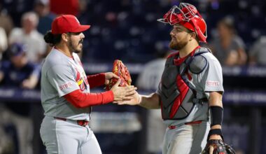 Aug 21, 2025; Tampa, Florida, USA; St. Louis Cardinals pitcher JoJo Romero (59) and catcher Pedro Pages (43) react after beating the Tampa Bay Rays at George M. Steinbrenner Field. Mandatory Credit: Nathan Ray Seebeck-Imagn Images