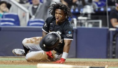Mar 30, 2026; Miami, Florida, USA;  Chicago White Sox second baseman Luisangel Acuna (0) reacts after scoring under the tag of Miami Marlins catcher Liam Hicks (not pictured) during the sixth inning at loanDepot Park. Mandatory Credit: Rhona Wise-Imagn Images