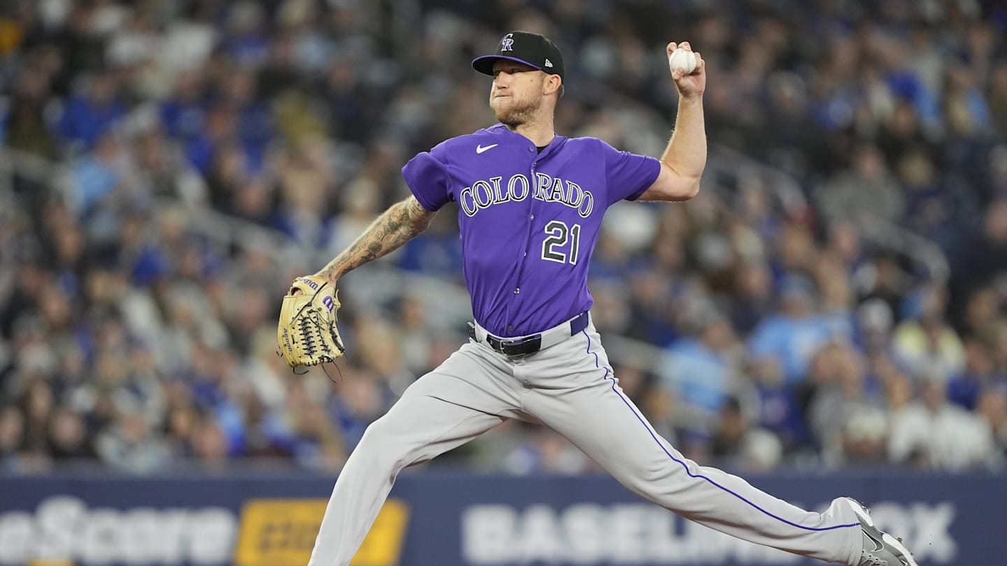 Apr 1, 2026; Toronto, Ontario, CAN; Colorado Rockies starting pitcher Kyle Freeland (21) pitches to the Toronto Blue Jays during the second inning at Rogers Centre. Mandatory Credit: John E. Sokolowski-Imagn Images