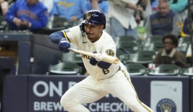 Apr 1, 2026; Milwaukee, Wisconsin, USA;  Milwaukee Brewers second baseman David Hamilton (6) bunts the ball against the Tampa Bay Rays for hit on an errand throw in the third inning at American Family Field. Mandatory Credit: Michael McLoone-Imagn Images