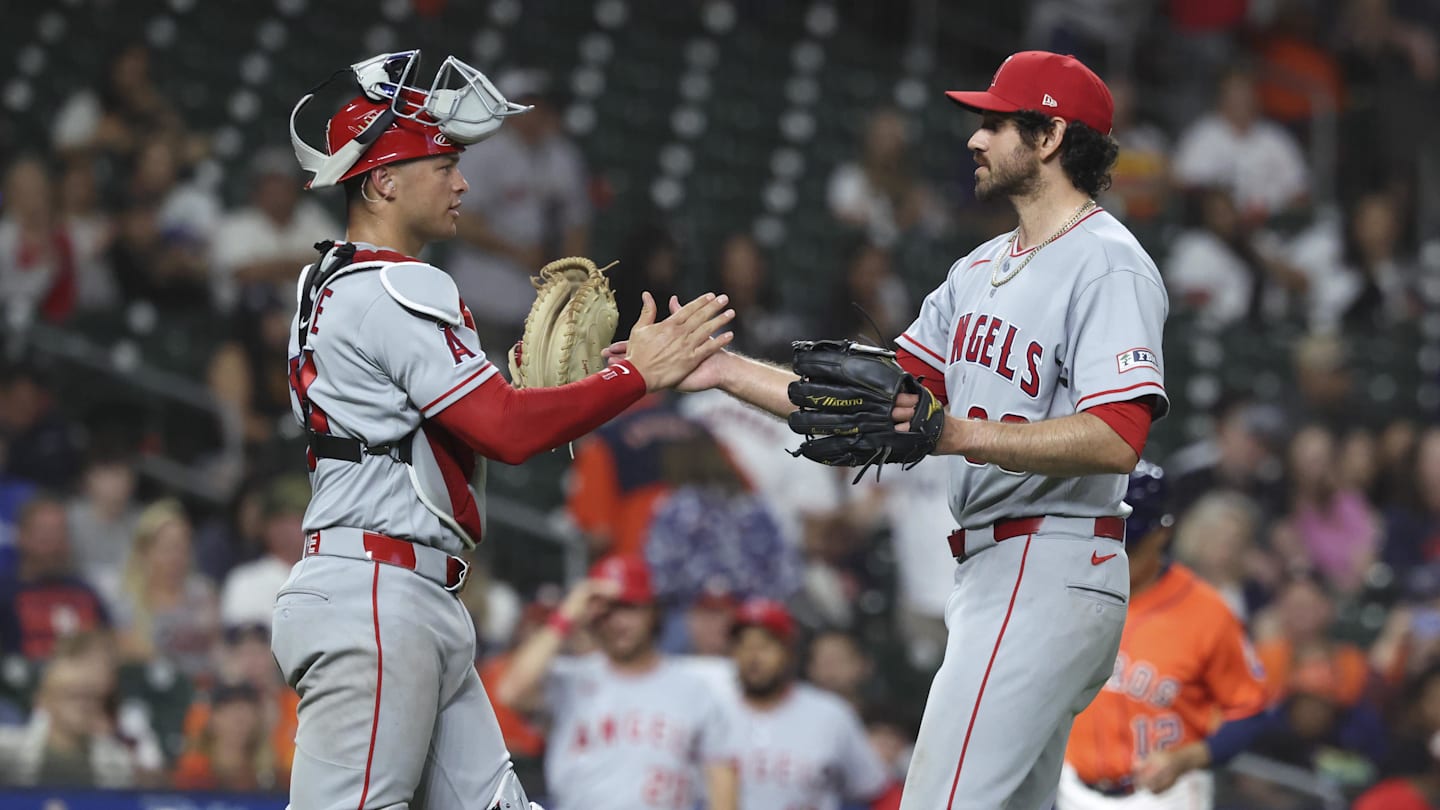 Mar 27, 2026; Houston, Texas, USA; Los Angeles Angels catcher Logan O'Hoppe (14) and pitcher Jordan Romano (68) celebrate after the game against the Houston Astros at Daikin Park. Mandatory Credit: Troy Taormina-Imagn Images