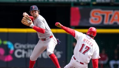 Boston Red Sox second baseman Marcelo Mayer (11) puts out Cincinnati Reds center fielder Dane Myers (17) before throwing out Tyler Stephenson to complete a double play in the second inning of the MLB Interleague game between the Cincinnati Reds and the Boston Red Sox at Great American Ball Park in downtown Cincinnati on Sunday, March 29, 2026. The game was scoreless after three innings.