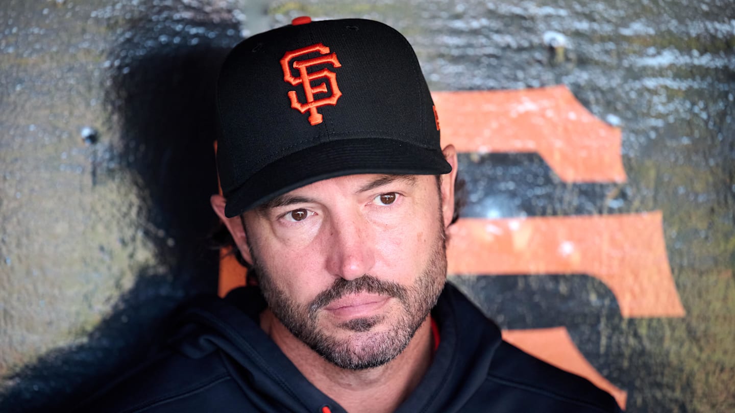 Apr 2, 2026; San Francisco, California, USA; San Francisco Giants manager Tony Vitello (23) speaks to the media in the dugout before the game against the New York Mets at Oracle Park. Mandatory Credit: Robert Edwards-Imagn Images