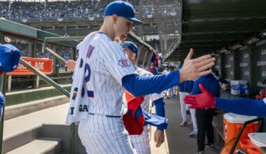 Mar 28, 2026; Chicago, Illinois, USA; Chicago Cubs pitcher Cade Horton (22) high fives teammates prior to a game againnst the Washington Nationals at Wrigley Field. Mandatory Credit: Patrick Gorski-Imagn Images