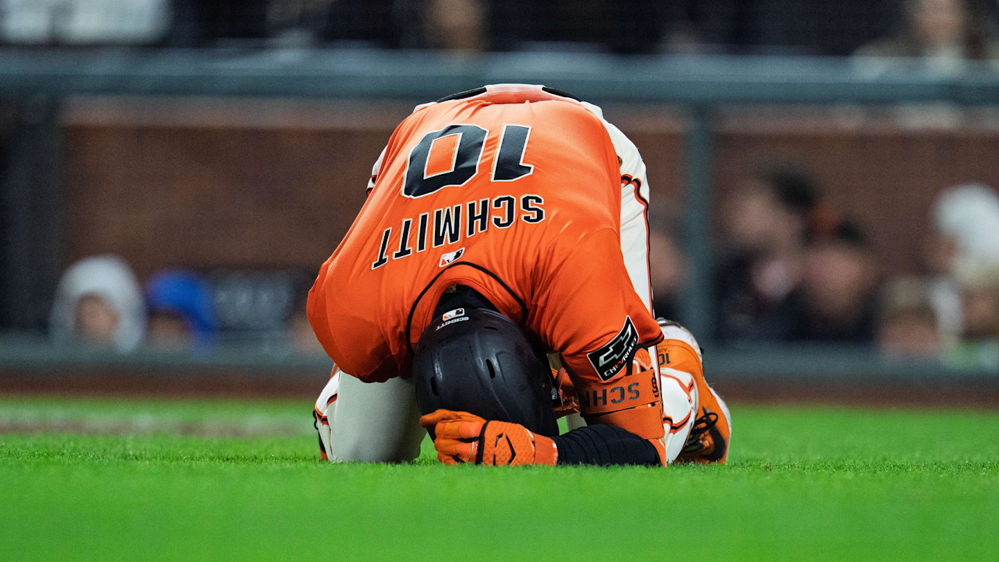 Aug 15, 2025; San Francisco, California, USA; San Francisco Giants third baseman Casey Schmitt (10) is hit by a pitch against the Tampa Bay Rays during the eighth inning at Oracle Park. Mandatory Credit: Neville E. Guard-Imagn Images