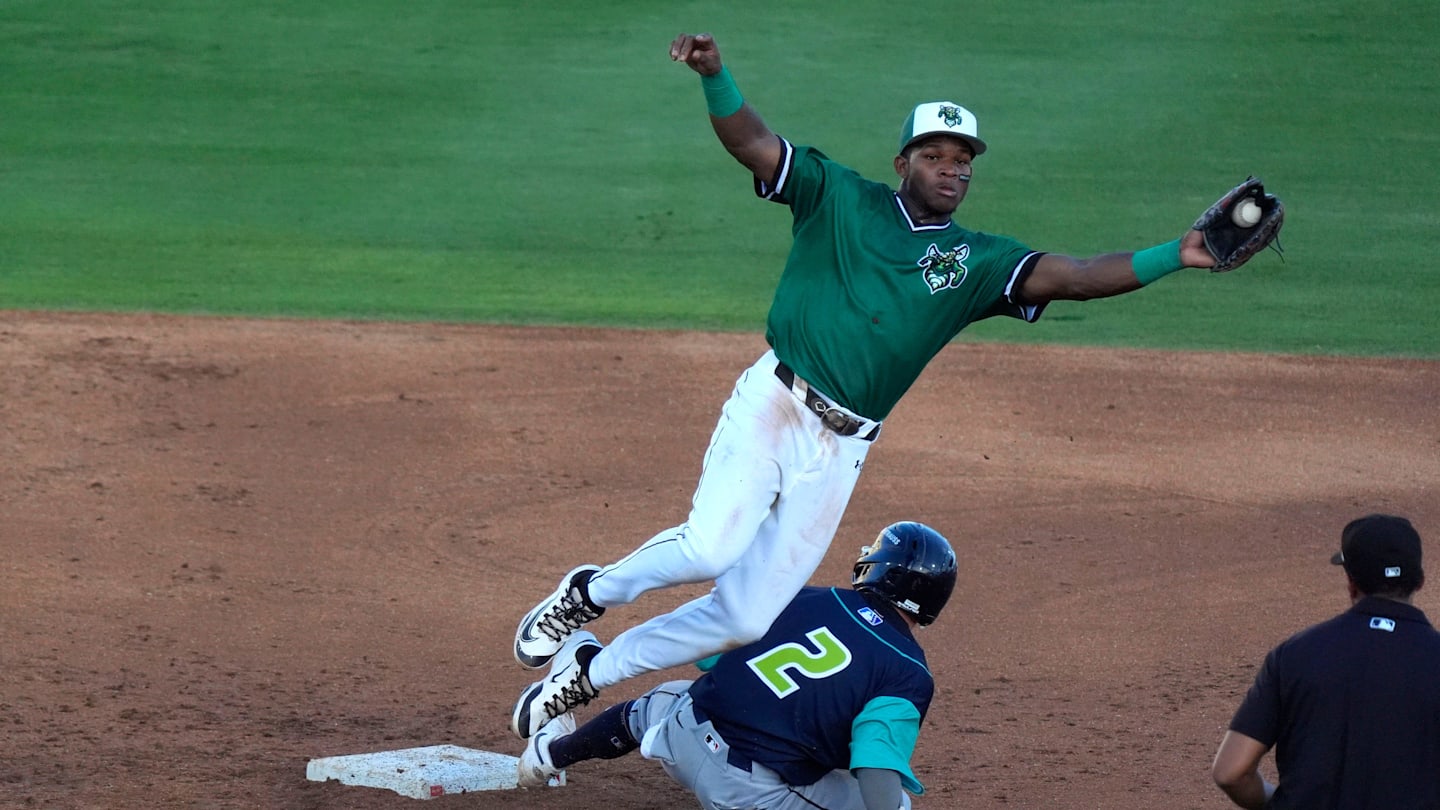 June 4, 2025; North Augusta, South Carolina, USA; Augusta GreenJacket infielder John Gil (7) slides into second base during the second game of the Augusta GreenJacket and Fayetteville series at SRP Park. Mandatory Credit: Katie Goodale - Augusta Chronicle/USA TODAY NETWORK