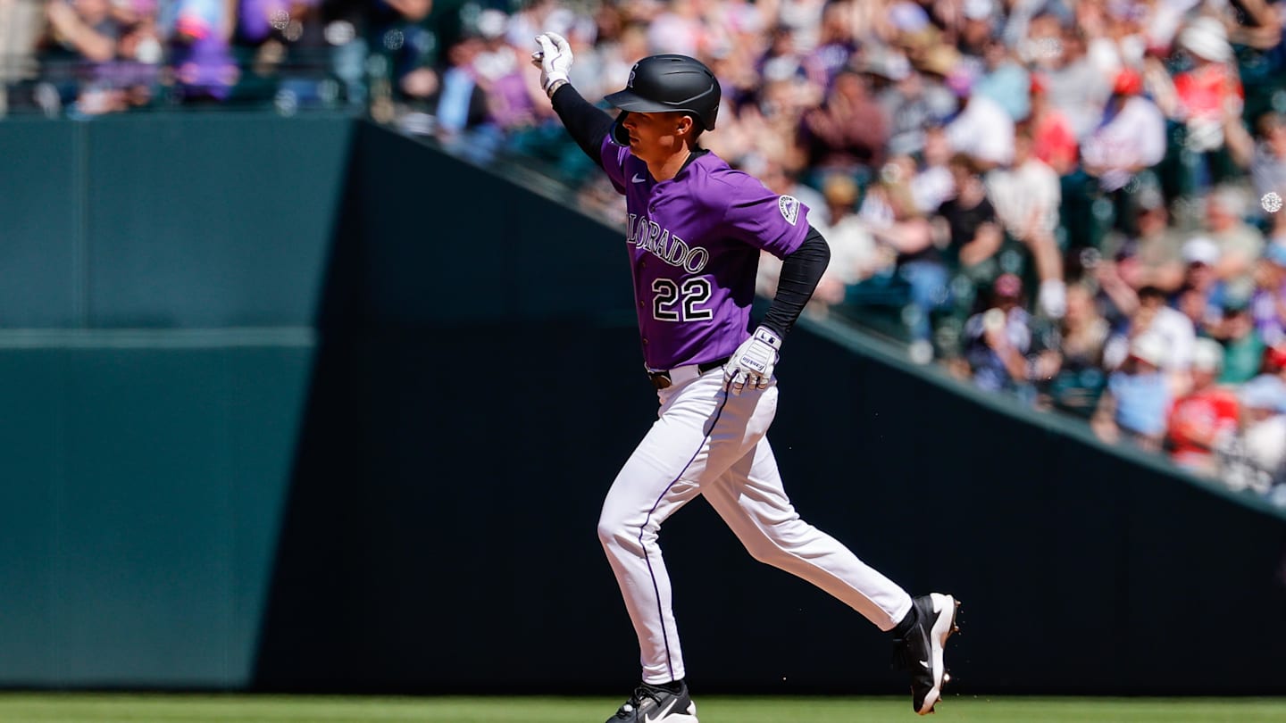 Apr 5, 2026; Denver, Colorado, USA; Colorado Rockies right fielder Mickey Moniak (22) rounds the bases on a solo home run in the fifth inning against the Philadelphia Phillies at Coors Field. Mandatory Credit: Isaiah J. Downing-Imagn Images