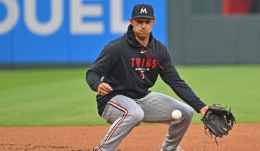 Apr 1, 2026; Kansas City, Missouri, USA;  Minnesota Twins shortstop Brooks Lee (22) fields a ground ball during pre-game against the Kansas City Royals at Kauffman Stadium. Mandatory Credit: Peter Aiken-Imagn Images
