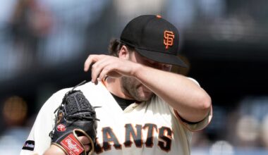 Apr 5, 2026; San Francisco, California, USA; San Francisco Giants pitcher Erik Miller (68) reacts to another hit by the New York Mets during the eighth inning at Oracle Park. Mandatory Credit: D. Ross Cameron-Imagn Images