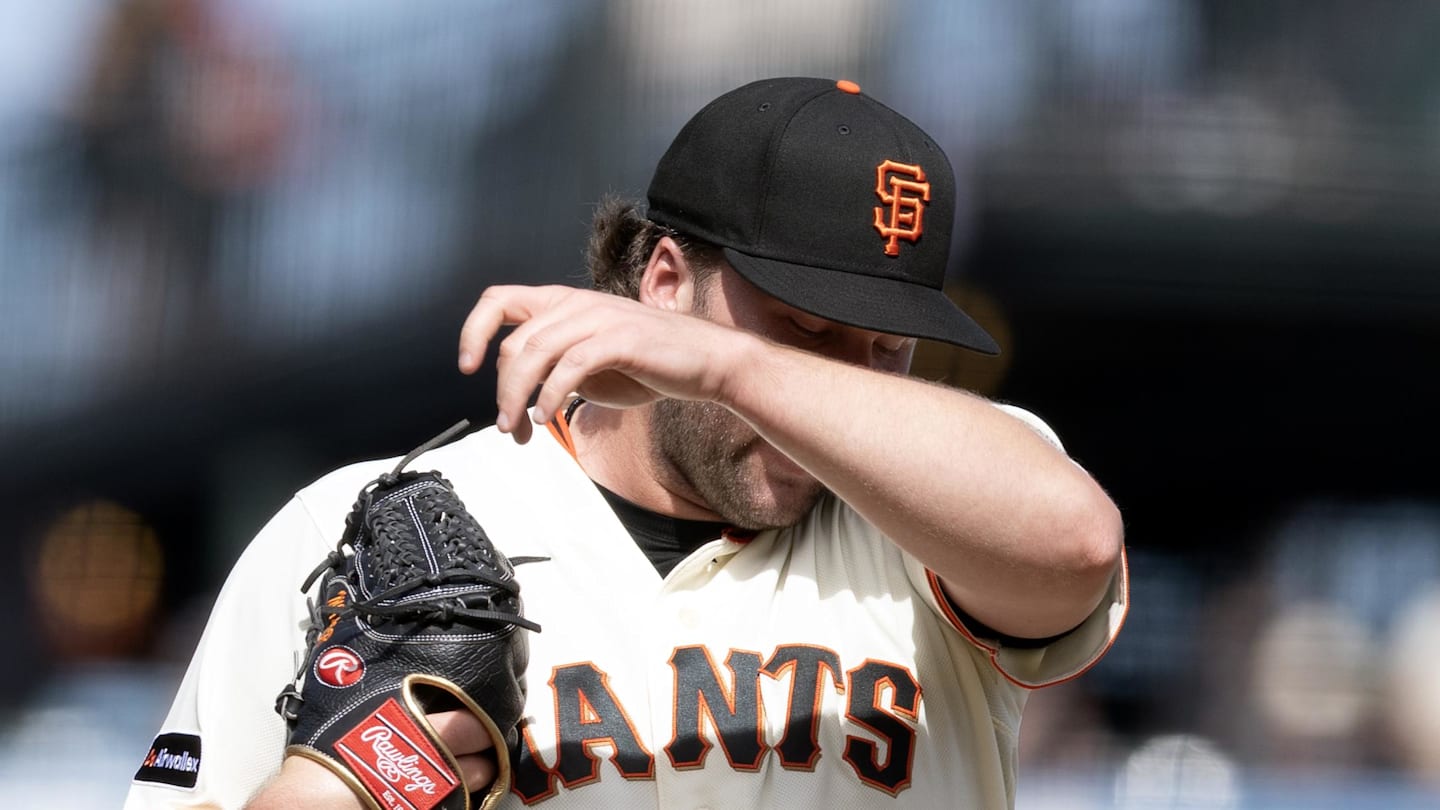 Apr 5, 2026; San Francisco, California, USA; San Francisco Giants pitcher Erik Miller (68) reacts to another hit by the New York Mets during the eighth inning at Oracle Park. Mandatory Credit: D. Ross Cameron-Imagn Images