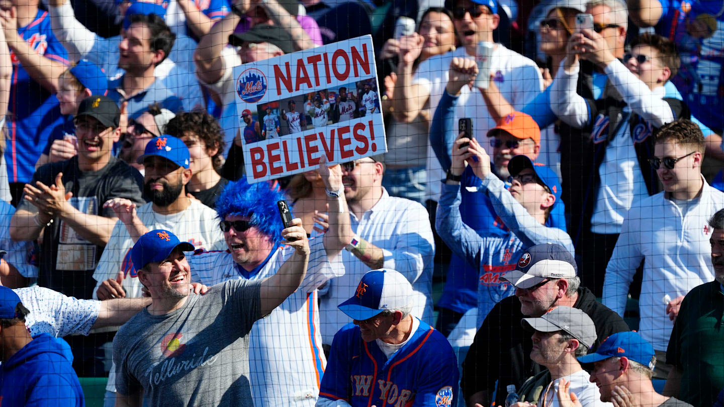 New York Mets fans celebrate on Opening Day, Thursday, March 26, 2026. Their team beat the Pittsburgh Pirates, 11-7.