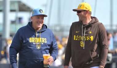 Feb 23, 2026; Peoria, Arizona, USA;  Milwaukee Brewers manager Pat Murphy (49) and San Diego Padres manager Craig Stammen (14) talk before the game at Peoria Sports Complex. Mandatory Credit: Jayne Kamin-Oncea-Imagn Images