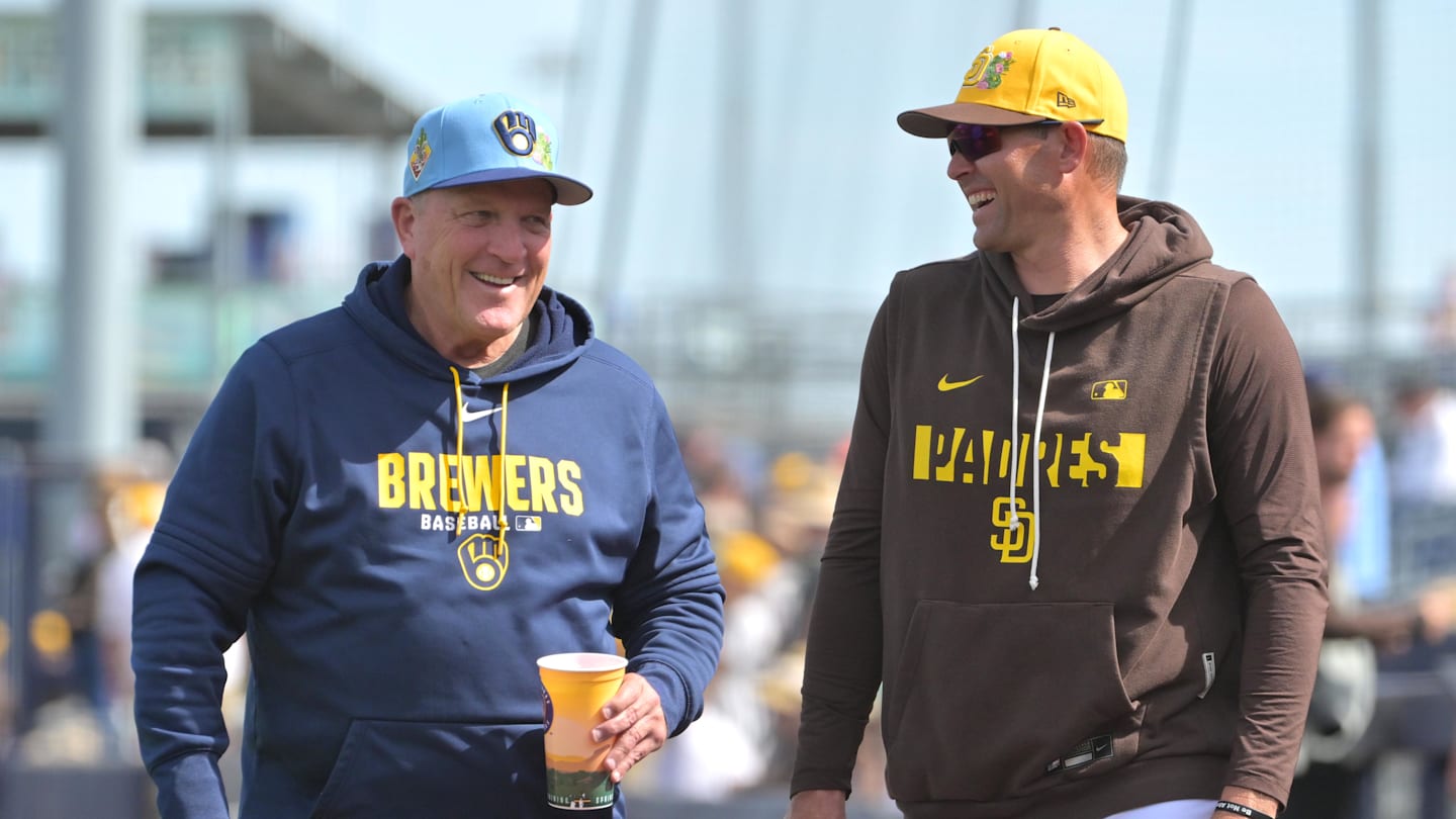 Feb 23, 2026; Peoria, Arizona, USA;  Milwaukee Brewers manager Pat Murphy (49) and San Diego Padres manager Craig Stammen (14) talk before the game at Peoria Sports Complex. Mandatory Credit: Jayne Kamin-Oncea-Imagn Images