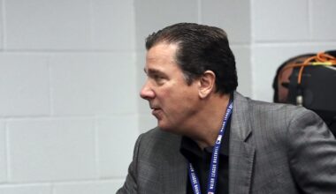 Jul 2, 2019; Arlington, TX, USA; Los Angeles Angels president John Carpino greets Texas Rangers general manager Jon Daniels before a press conference about the death of pitcher Tyler Skaggs before the game against the Texas Rangers at Globe Life Park in Arlington. Mandatory Credit: Kevin Jairaj-Imagn Images