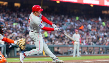 Apr 6, 2026; San Francisco, California, USA; Philadelphia Phillies catcher J.T. Realmuto (10) singles during the second inning San Francisco Giants at Oracle Park. Mandatory Credit: Bob Kupbens-Imagn Images