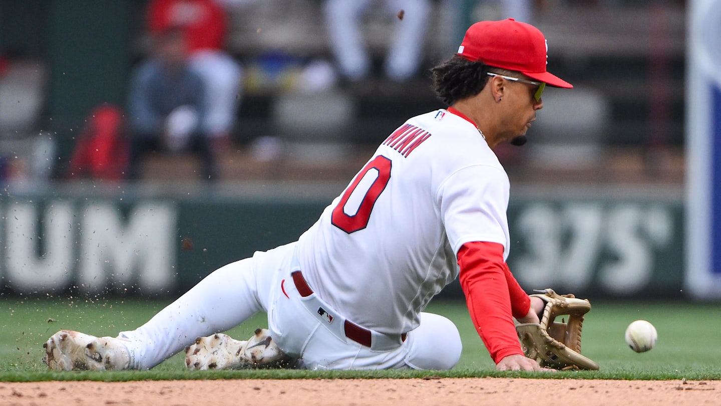 Apr 1, 2026; St. Louis, Missouri, USA; St. Louis Cardinals shortstop Masyn Winn (0) slides and fields a ground ball against the New York Mets during the eighth inning at Busch Stadium. Mandatory Credit: Jeff Curry-Imagn Images