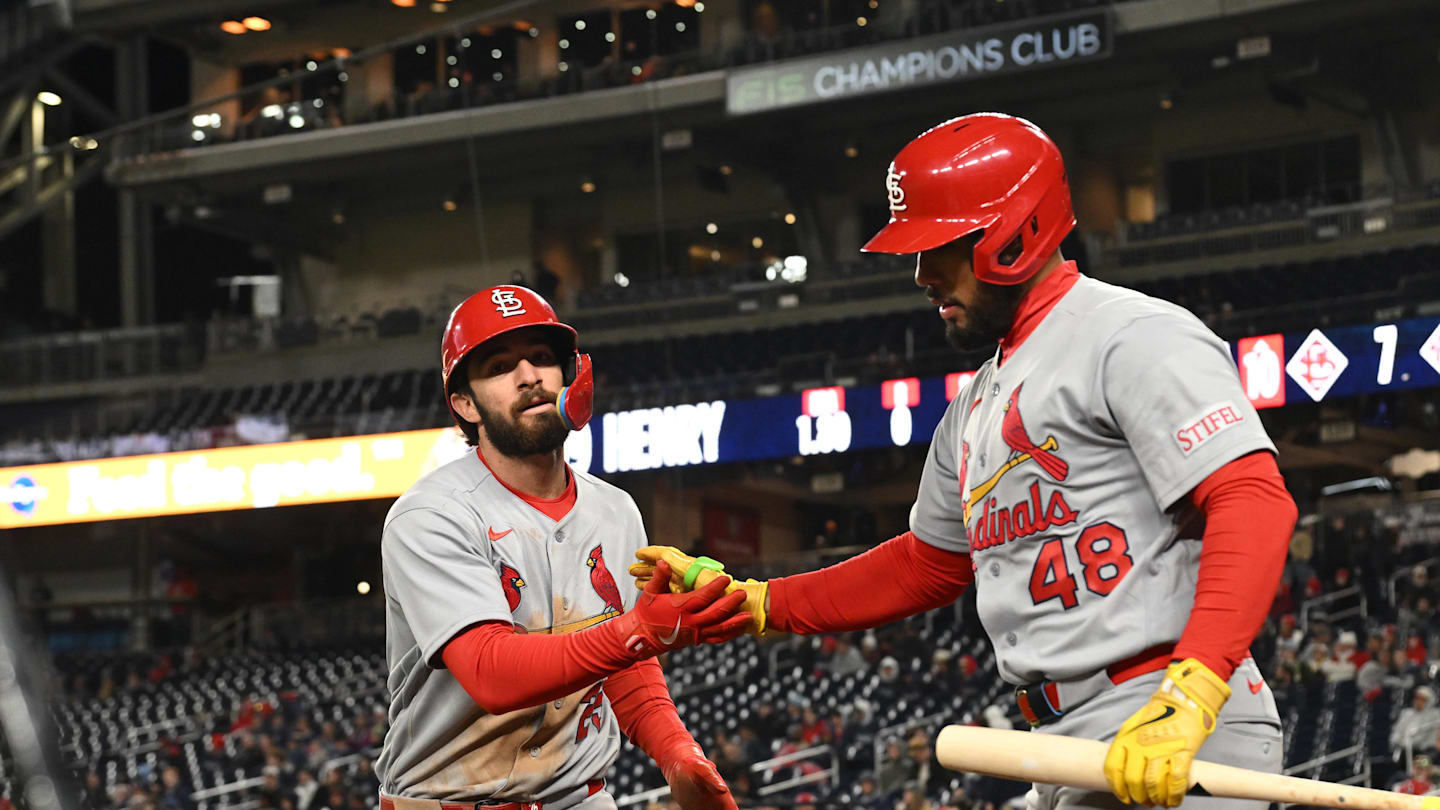 Apr 7, 2026; Washington, District of Columbia, USA; St. Louis Cardinals second baseman Thomas Saggese (25) celebrates scoring a run with catcher Ivan Herrera (48) against the Washington Nationals during the tenth inning at Nationals Park. Mandatory Credit: Rafael Suanes-Imagn Images