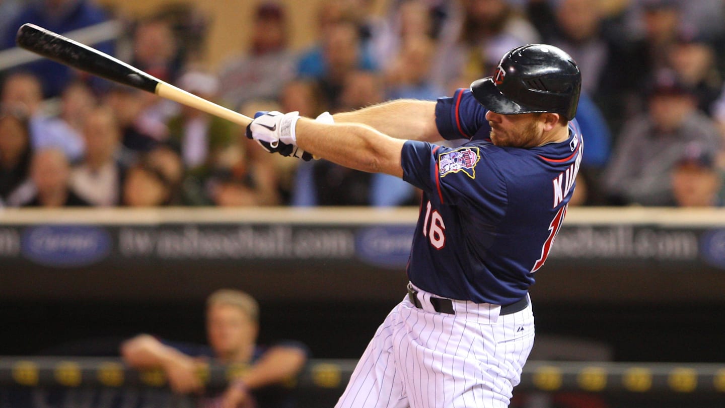 Apr 12, 2011; Minneapolis, MN, USA; Minnesota Twins designated hitter Jason Kubel (16) hits a double during the tenth inning against the Kansas City Royals at Target Field. The Twins defeated the Royals 4-3. Mandatory Credit: Brace Hemmelgarn-Imagn Images
