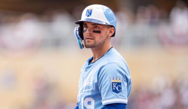 May 24, 2025; Minneapolis, Minnesota, USA; The third base umpire calls Kansas City Royals left fielder Michael Massey (19) out for swinging on a ball pitched by Minnesota Twins starting pitcher Zebby Matthews (52, not shown) in the second inning at Target Field. Mandatory Credit: Matt Blewett-Imagn Images