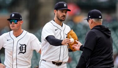 Detroit Tigers pitcher Drew Anderson (38) hands the ball to manager A.J. Hinch (14) for pitching change against Kansas City Royals during the seventh inning at Comerica Park in Detroit on Thursday, April 16, 2026.