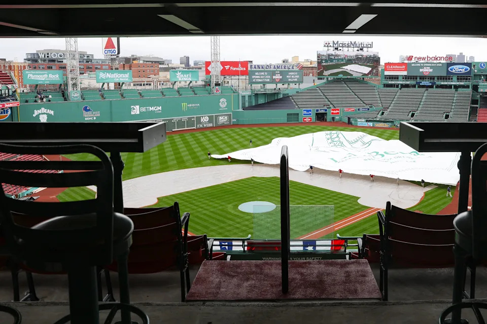 Red Sox field crew adjusts the tarp ahead of Opening Day. Shown during an Opening Day preview event at Fenway Park on Thursday, April 2, 2026.