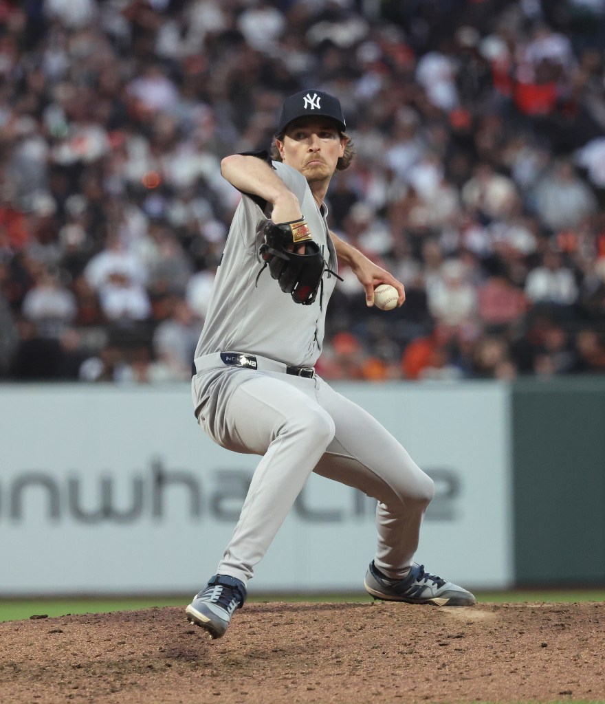 New York Yankees pitcher Max Fried (54) throws a pitch during the 7th inning.