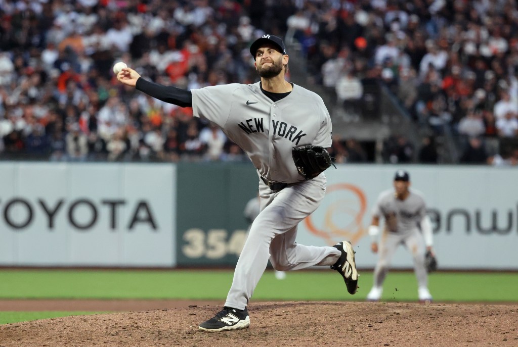 New York Yankees pitcher Jake Bird throws a pitch during the 7th inning.