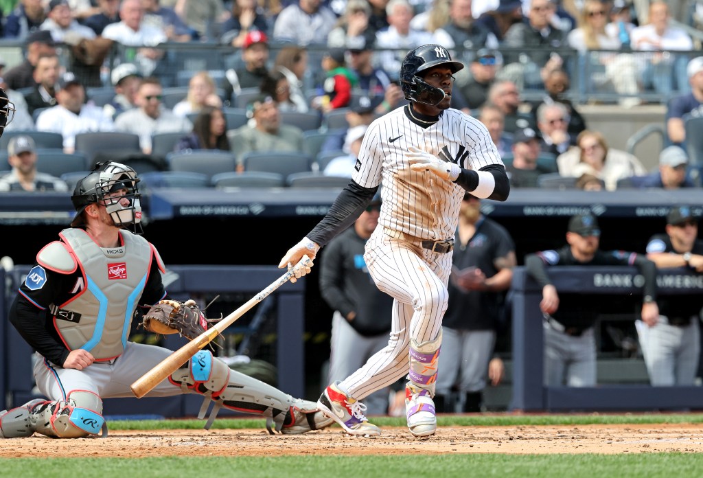 New York Yankees second baseman Jazz Chisholm Jr. (13) hits a double.