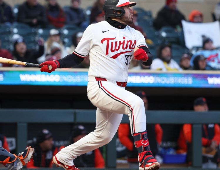 Minnesota Twins Catcher Victor Caratini hits an RBI Sac Fly against the Detroit Tigers during the third inning of a baseball game on April 6th 2026 in Minneapolis (AP Photo/Matt Krohn)